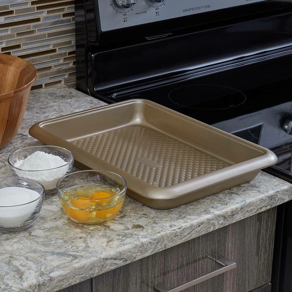 Aurelia Gold Non-Stick 14.5 in. x 10.6 in. x 1.75 in. Carbon Steel Roaster Pan by Home Basics 4 Aurelia Gold Non-Stick 14.5 in. x 10.6 in. x 1.75 in. Carbon Steel Roaster Pan by Home Basics - Image 4