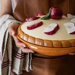 50 oz. Round Stoneware Pie Keeper with Apple Lid by Over and Back -Cheap Bakeware Store multi over and back pie plates 936557 1f 1000