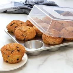 12-Cup Muffin Pan with High-Domed Lid by Nordic Ware -Cheap Bakeware Store nordic ware baking sheets 45593m 44 1000