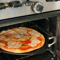 1-Piece Cast Iron 14 in. Pizza Iron by Outset -Cheap Bakeware Store outset pizza accessories 76612 1f 1000