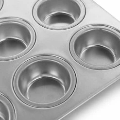 Baker's Glee 12-Cup Aluminum Muffin Pan in Silver by Oster -Cheap Bakeware Store silver oster cupcake pans muffin pans 985115194m 1f 1000