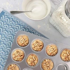 Baker's Glee 12-Cup Aluminum Muffin Pan in Silver by Oster -Cheap Bakeware Store silver oster cupcake pans muffin pans 985115194m fa 1000